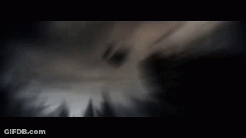 Man Standing In Front Of Stormy Sky GIF