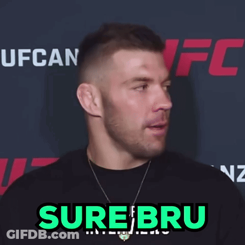 Man Standing In Front Of Sure Bru Sign GIF