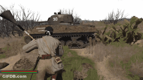 Man Standing In Front Of Tank Number 30 GIF