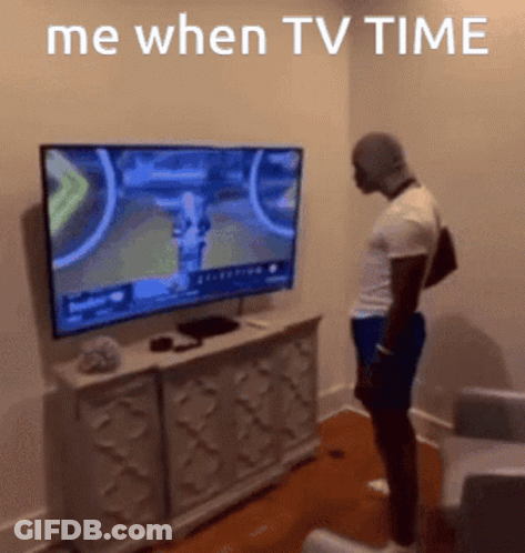 Man Standing In Front Of TV Saying Me When TV Time GIF