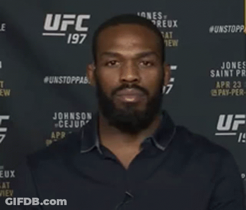 Man Standing In Front Of UFC 197 Banner GIF