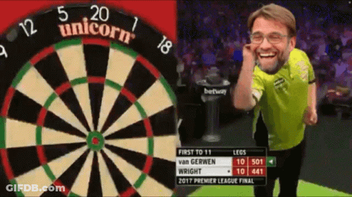 Man Standing In Front Of Unicorn Dart Board GIF
