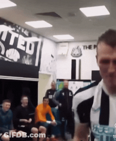 Man Standing In Front Of United Sign GIF