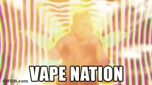 Man Standing In Front Of Vape Nation Background GIF