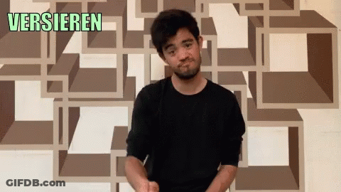 Man Standing In Front Of Versieren Wall GIF