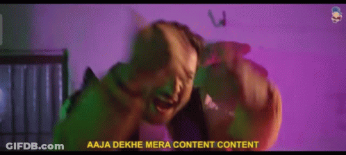 Man Standing In Front Of Wall Saying Aaja Dekhe Mera Content GIF