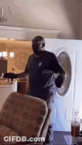Man Standing In Front Of Washing Machine GIF