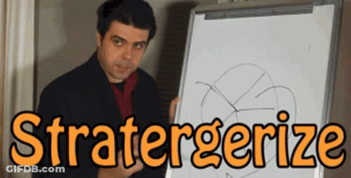 Man Standing In Front Of Whiteboard Saying Stratergerize GIF