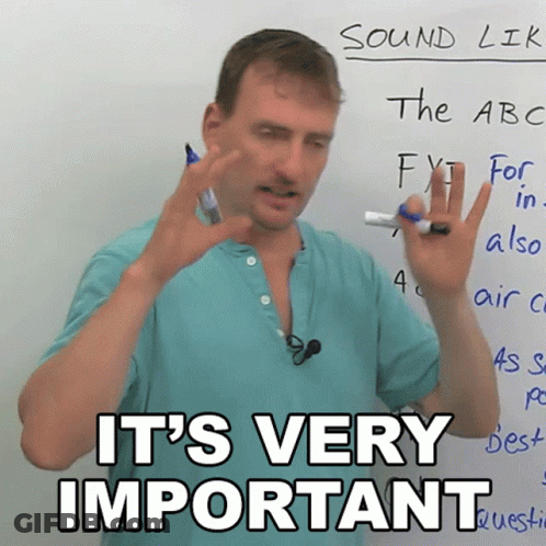 Man Standing In Front Of Whiteboard With Important Words GIF