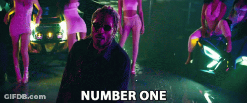 Man Standing In Front Of Women With Number One GIF