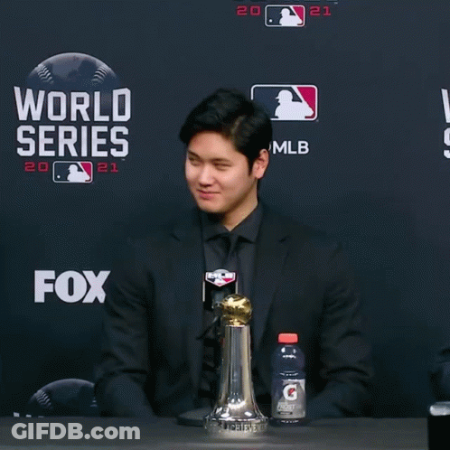 Man Standing In Front Of World Series 2021 GIF