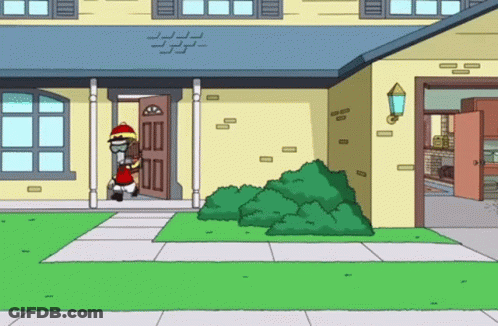Man Standing In Front Of Yellow House GIF