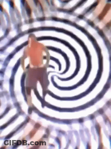 Man Standing In Hypnotic Swirl GIF