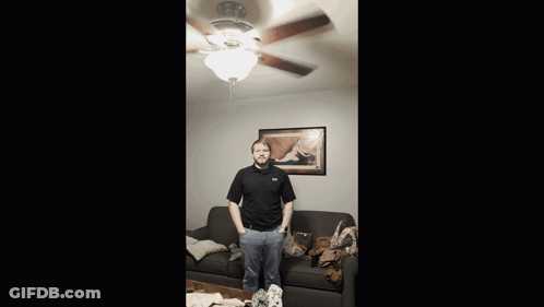 Man Standing In Living Room GIF