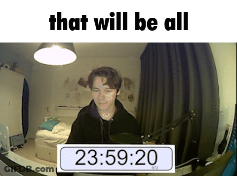 Man Standing In Room With Sign GIF