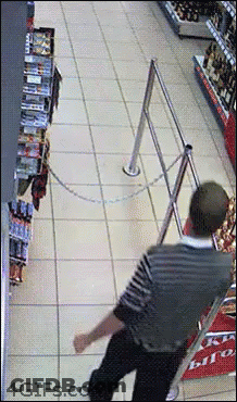 Man Standing In Store GIF