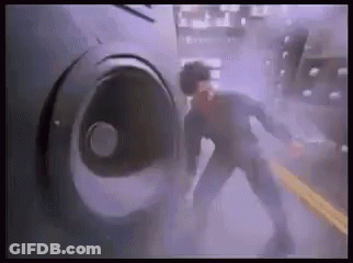Man Standing In Tunnel GIF