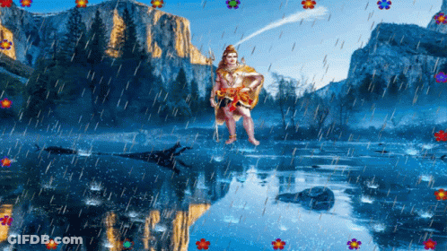 Man Standing In Water With Mountain GIF