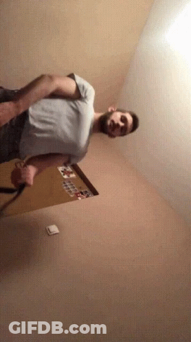 Man Standing Near Light Switch GIF