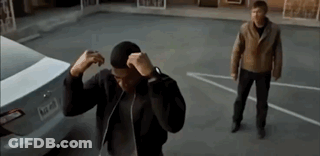 Man Standing Next To Car In Parking Lot GIF