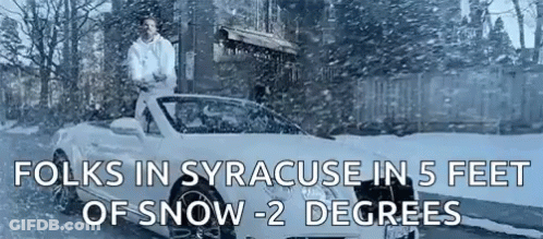 Man Standing Next To Car In Snow GIF