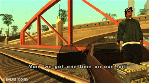 Man Standing Next To Car Saying Man We Got One-Time On Our Tail GIF
