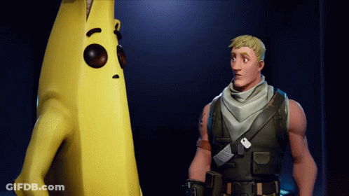 Man Standing Next To Large Yellow Banana GIF