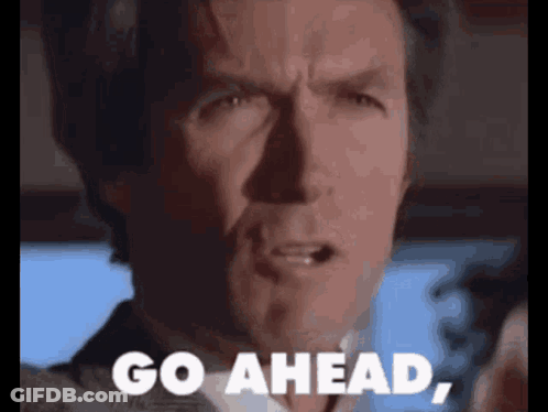 Man Standing Next To Pink Ball On Blue Mat GIF