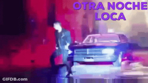 Man Standing Next To Police Car Otra Noche Loca GIF