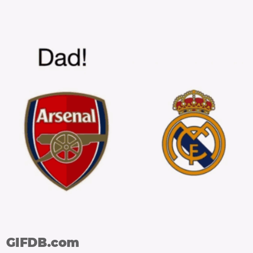 Man Standing Next To Real Madrid Logo GIF