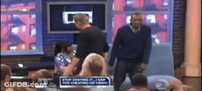 Man Standing Next To Stop Serving Sign GIF