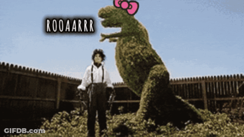 Man Standing Next To T-Rex Saying Rooaarrr GIF