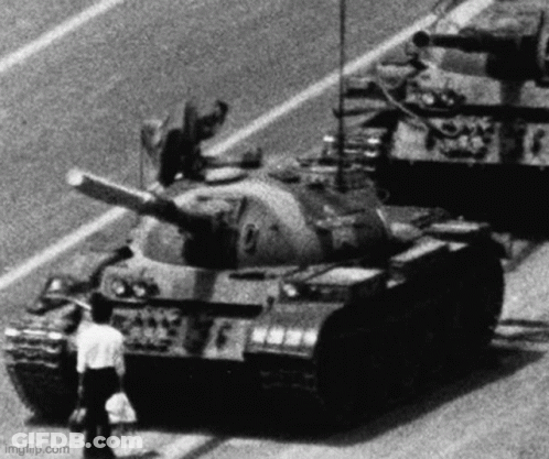 Man Standing Next To Tank GIF