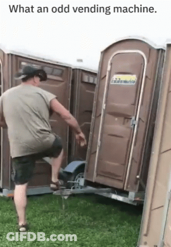 Man Standing Next To Trailer With Portable Toilet GIF