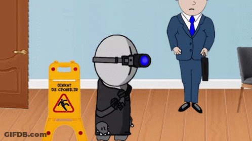 Man Standing Next To Yellow Dikkat Sign GIF