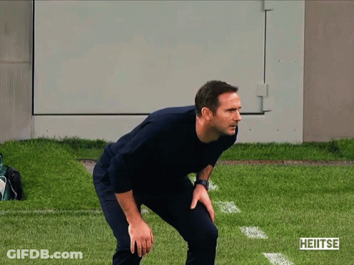 Man Standing On Field With Heitse Text GIF