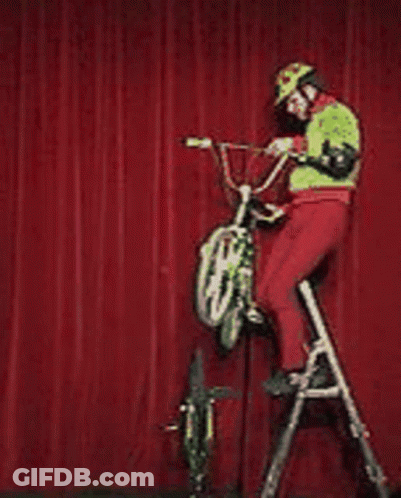 Man Standing On Ladder With Bicycle GIF