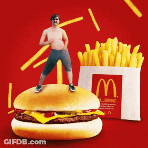 Man Standing On McDonald's Hamburger GIF