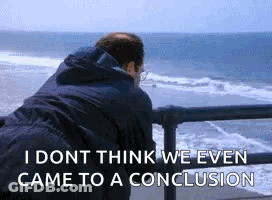 Man Standing On Pier Looking At Ocean I Dont Think We Even Came To A Conclusion GIF