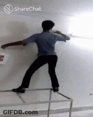 Man Standing On Railing With Bucket GIF