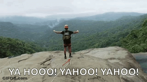 Man Standing On Rock Saying Yahoo GIF