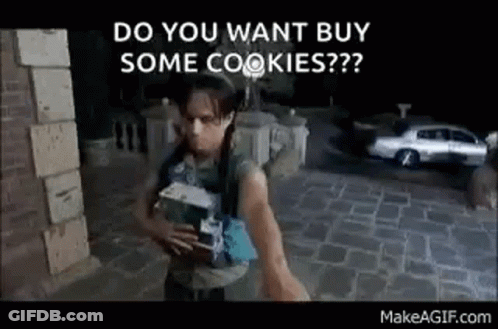 Man Standing On Sidewalk Holding Water And Cookies GIF