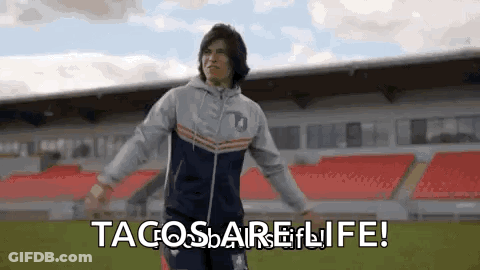 Man Standing On Soccer Field With Arms Outstretched GIF