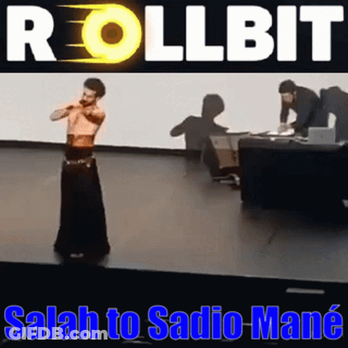 Man Standing On Stage Rollbit Salah To Sadio Mane GIF