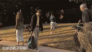 Man Standing On Stairs Looking Down GIF