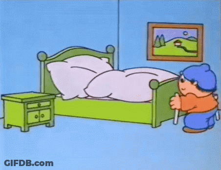 Man Standing On Stool In Front Of Bed GIF
