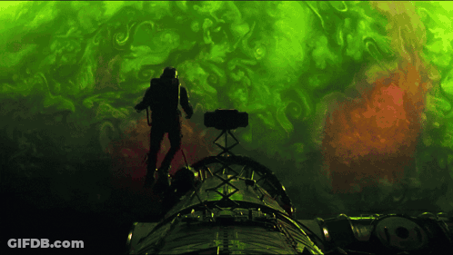Man Standing On Top Of A Rocket GIF