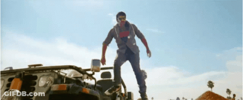 Man Standing On Vehicle Hood GIF