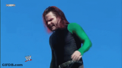 Man Standing On WWE Sign GIF