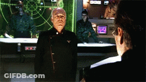Man Stands In Front Of Screen Saying XYZ GIF